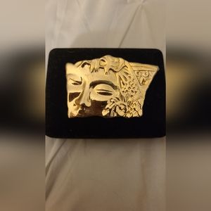 Contemporary face pin